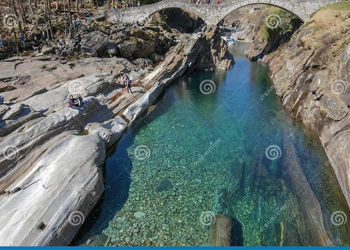 Lavertezzo Roman Bridge Tourists Visiting the Famous Roman Bridge of Lavertezzo on ... photo